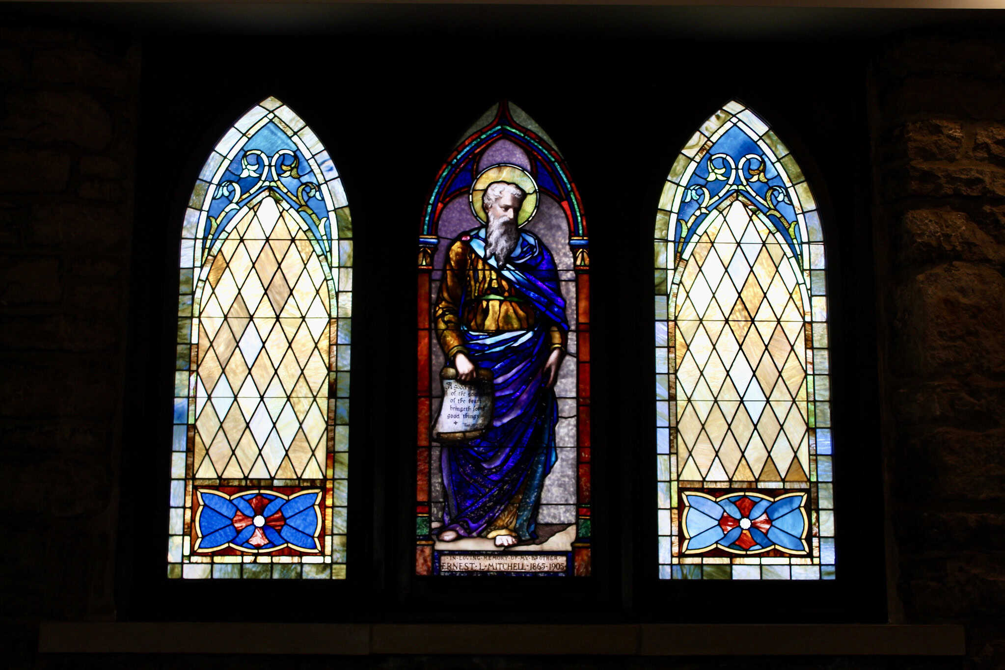 Beautiful stained glass window at Calvary Episcopal Church featuring religious imagery.