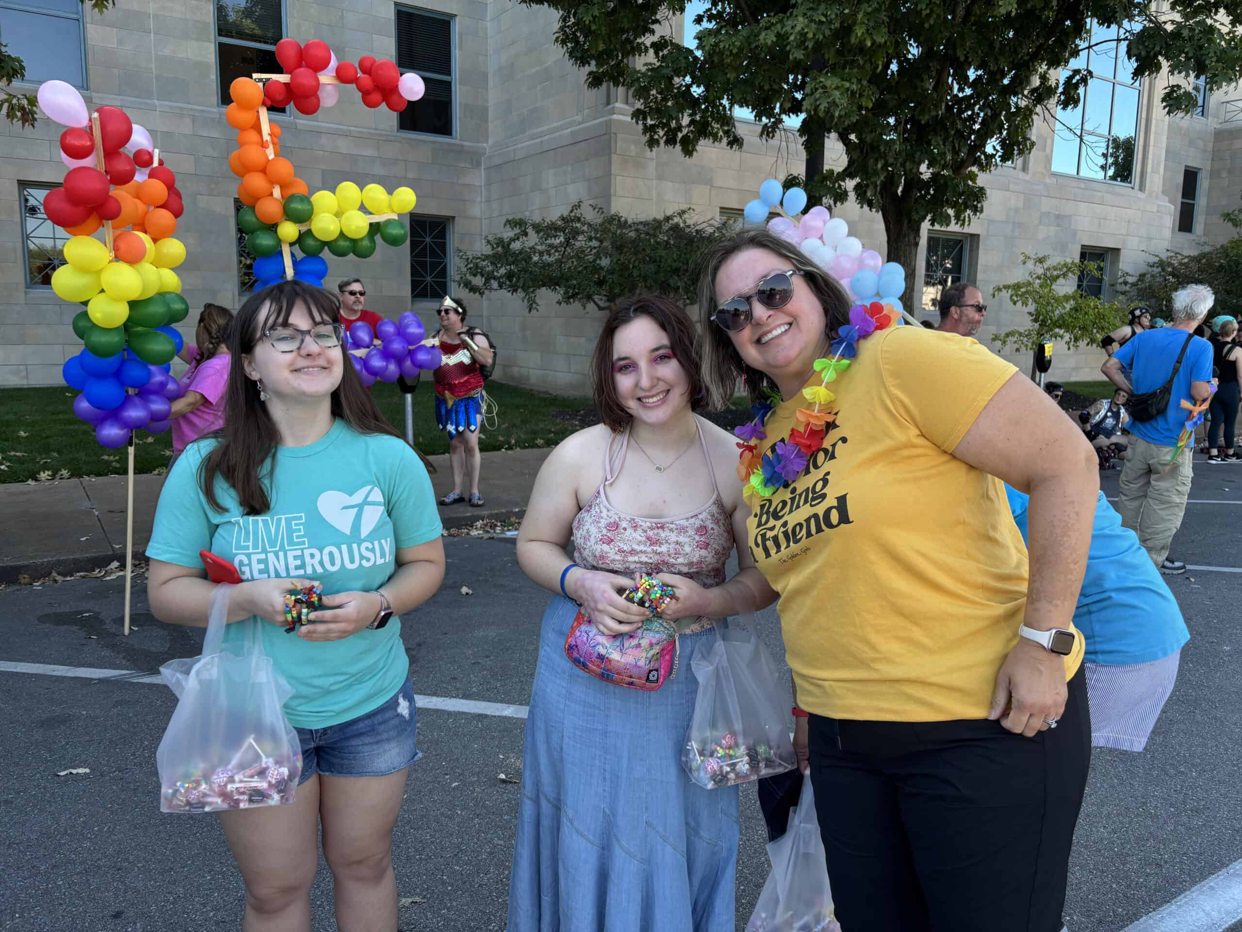 Interior view of Calvary Episcopal Church with wooden pews and a cross on the stone wall.